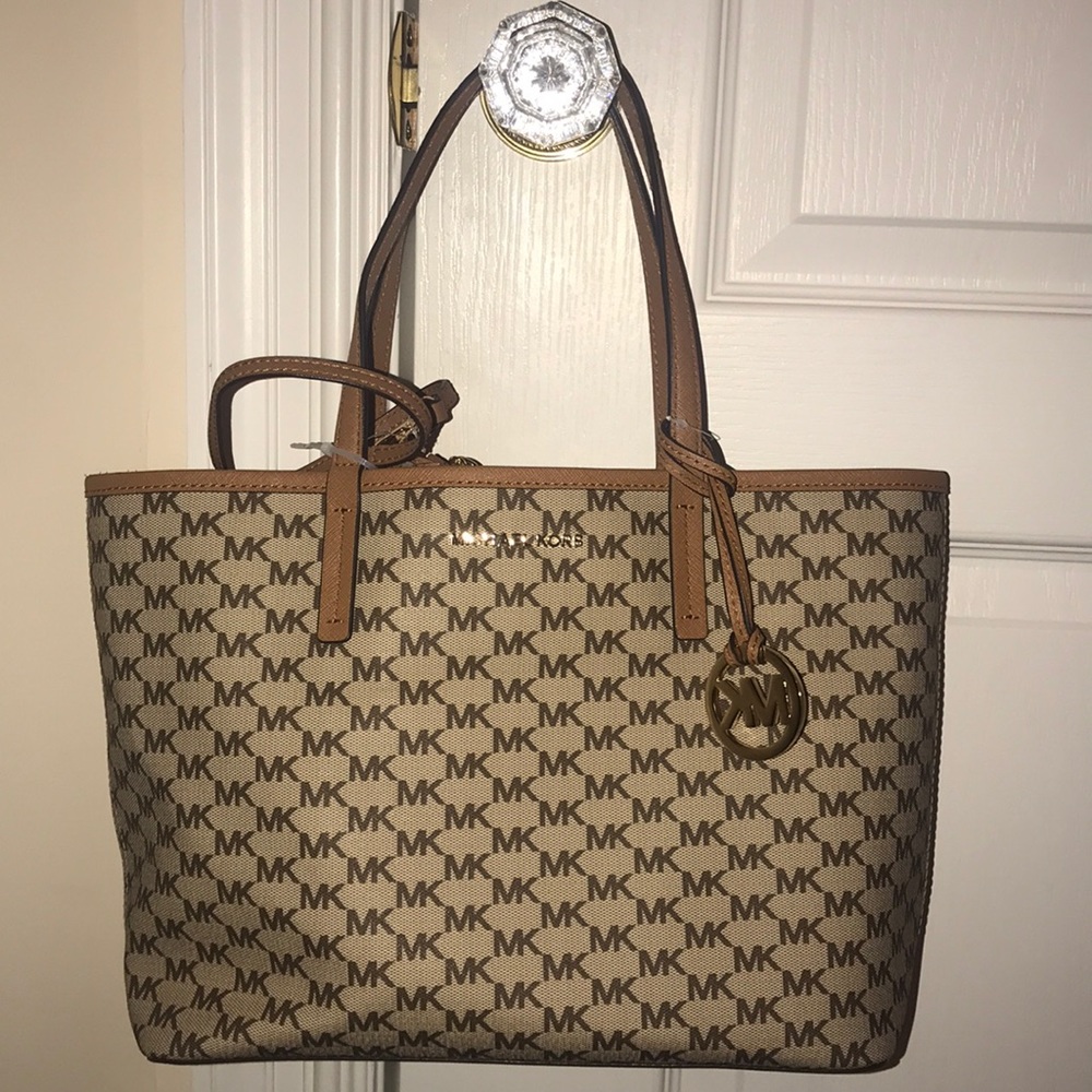 Brand new Michael Kors purse with wristlet